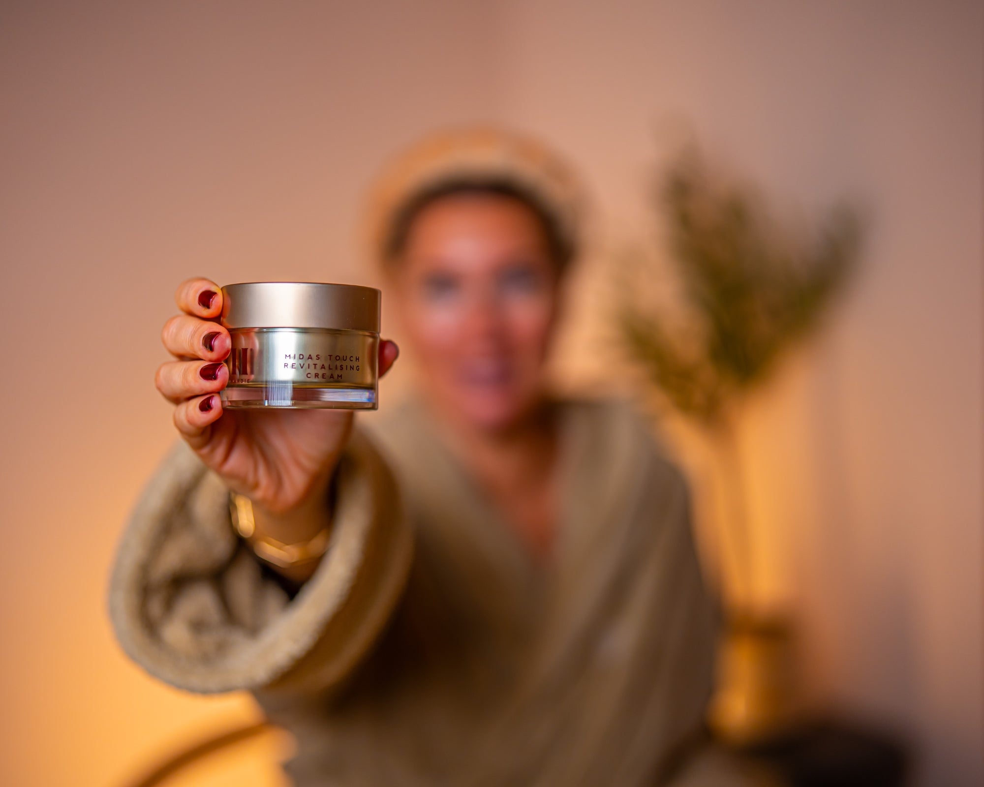 Woman holding EH product during menopause