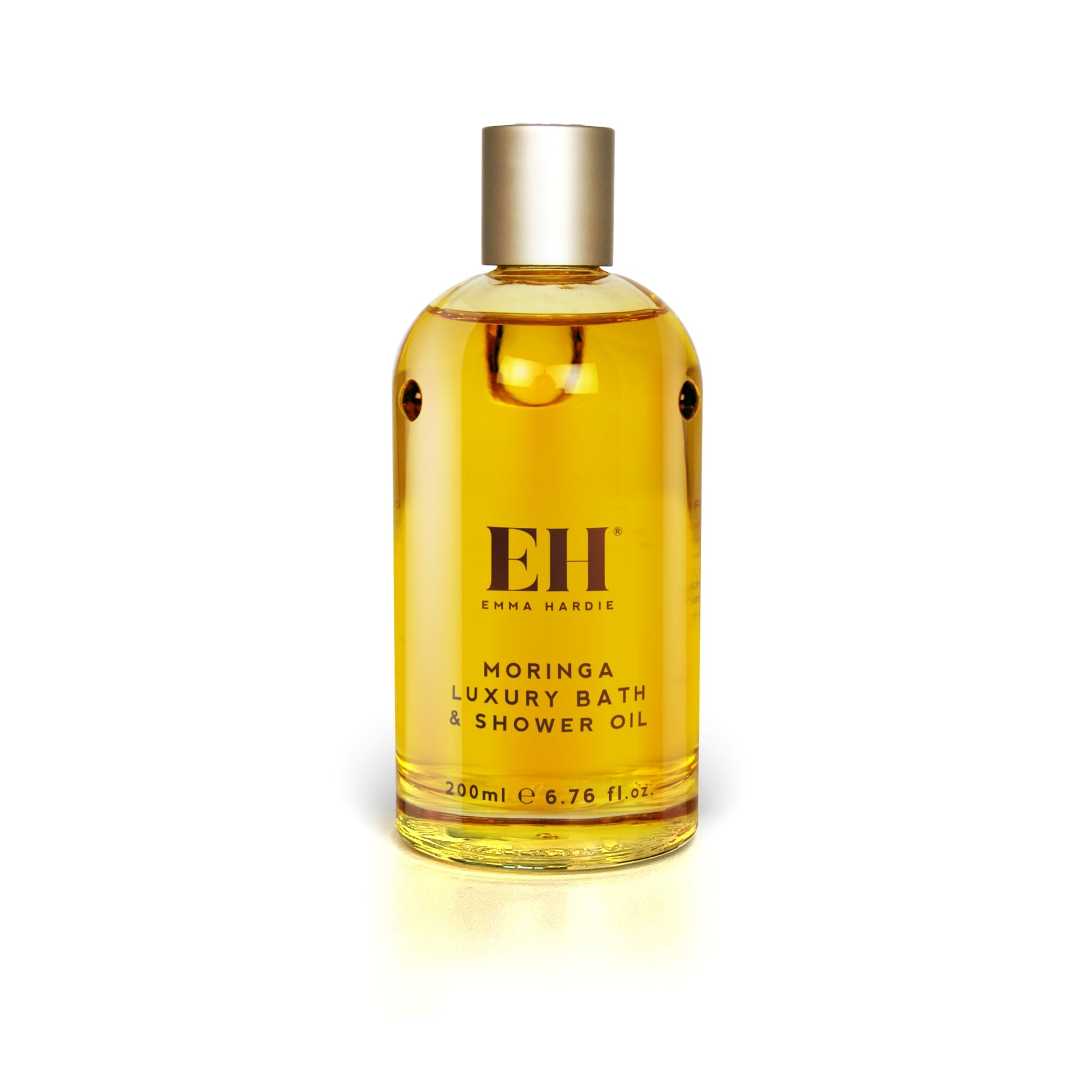 Bottle of Moringa Luxury Bath & Shower Oil by Emma Hardie on a white background