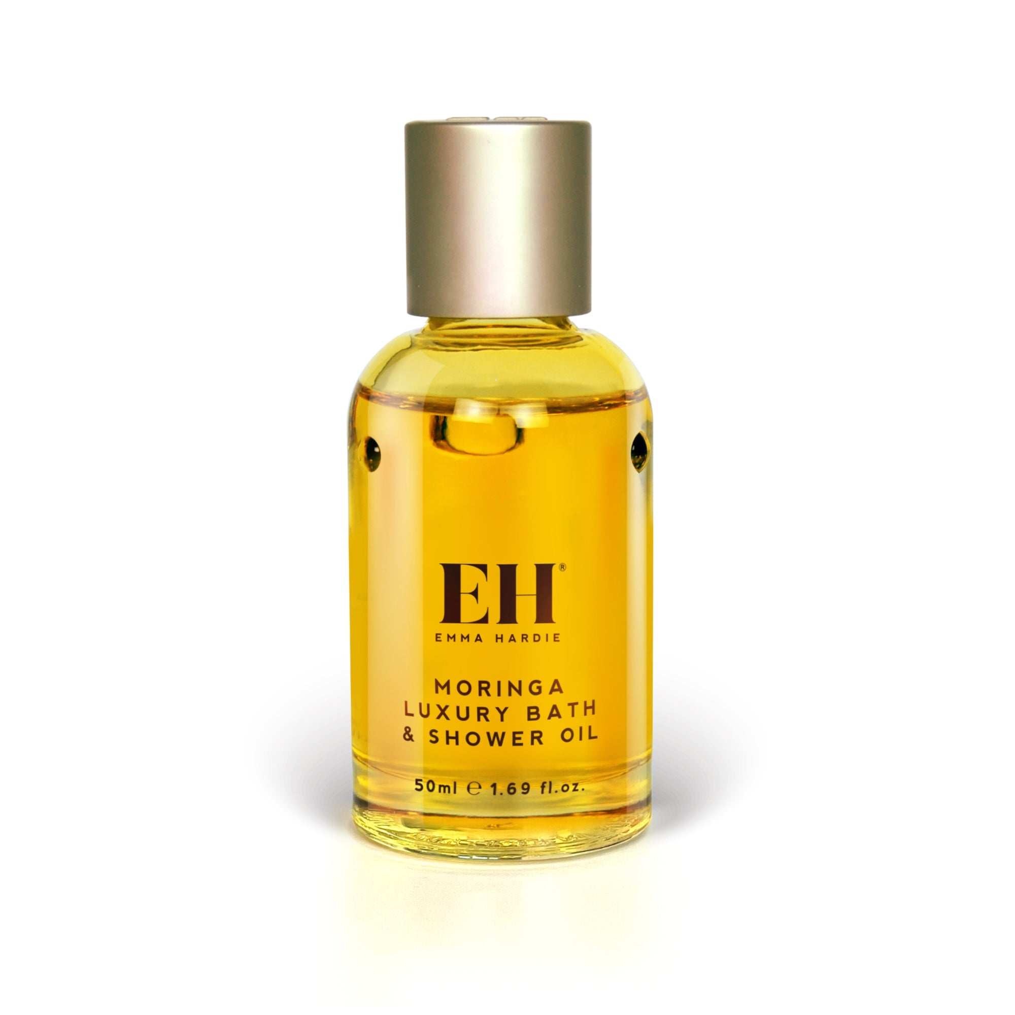 Bottle of Emma Hardie Moringa Luxury Bath & Shower Oil on a white background