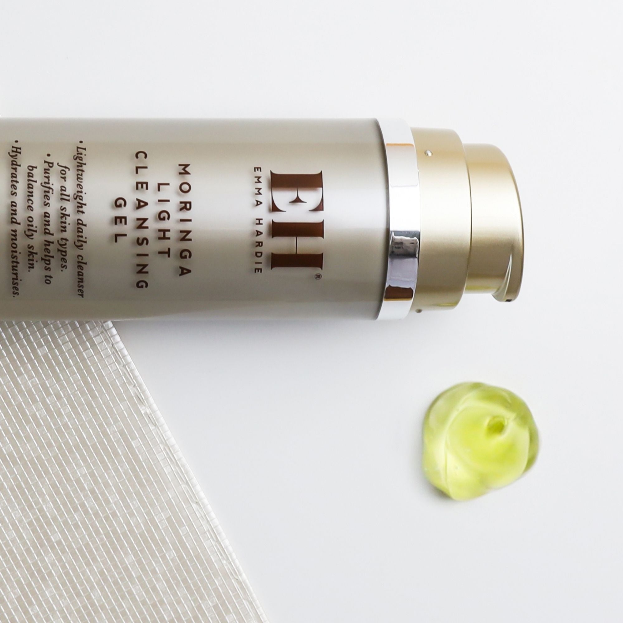 Emma Hardie Moringa Light Cleansing Gel with a small amount of gel shown beside the bottle.