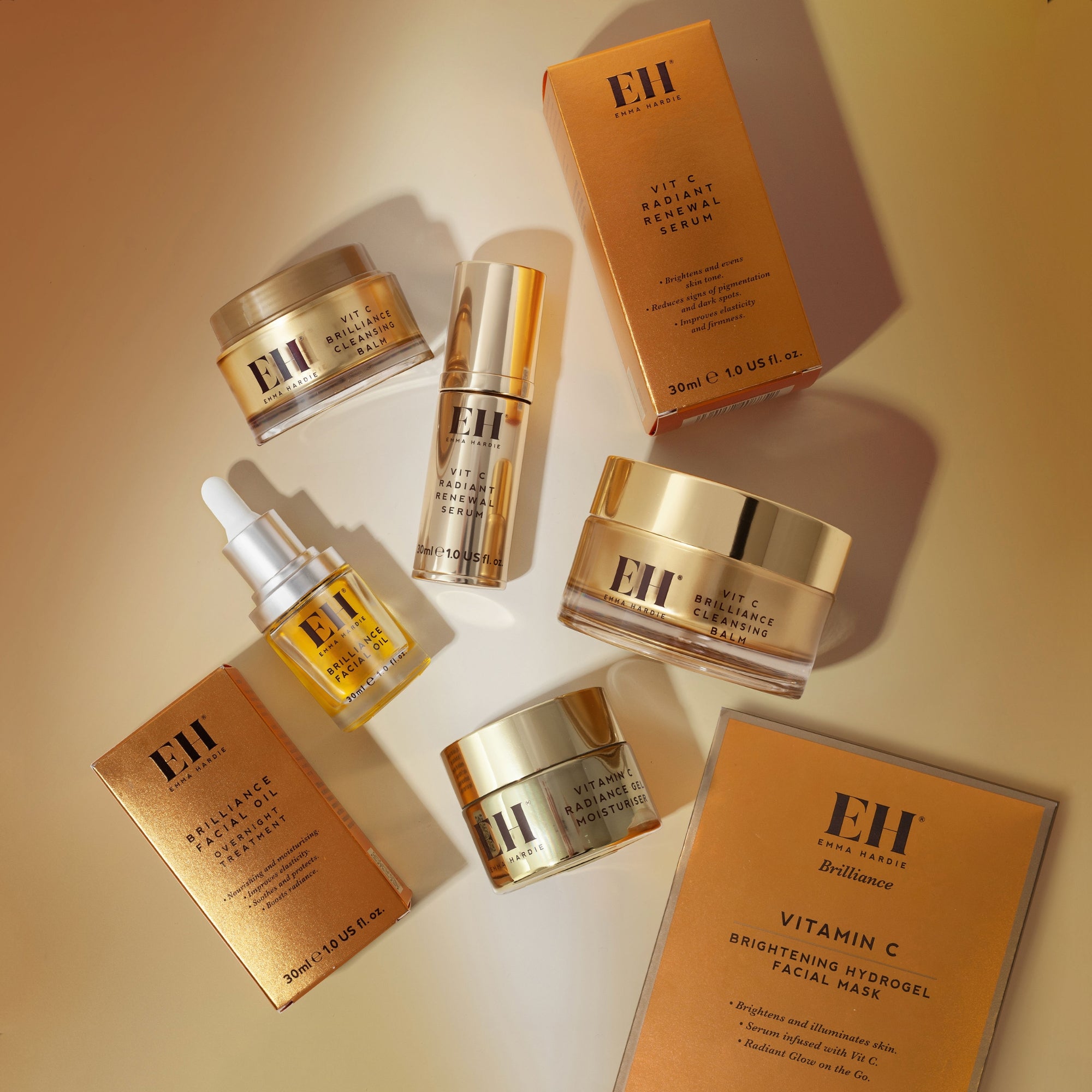 Full collection of Emma Hardie Vit C products on a beige background