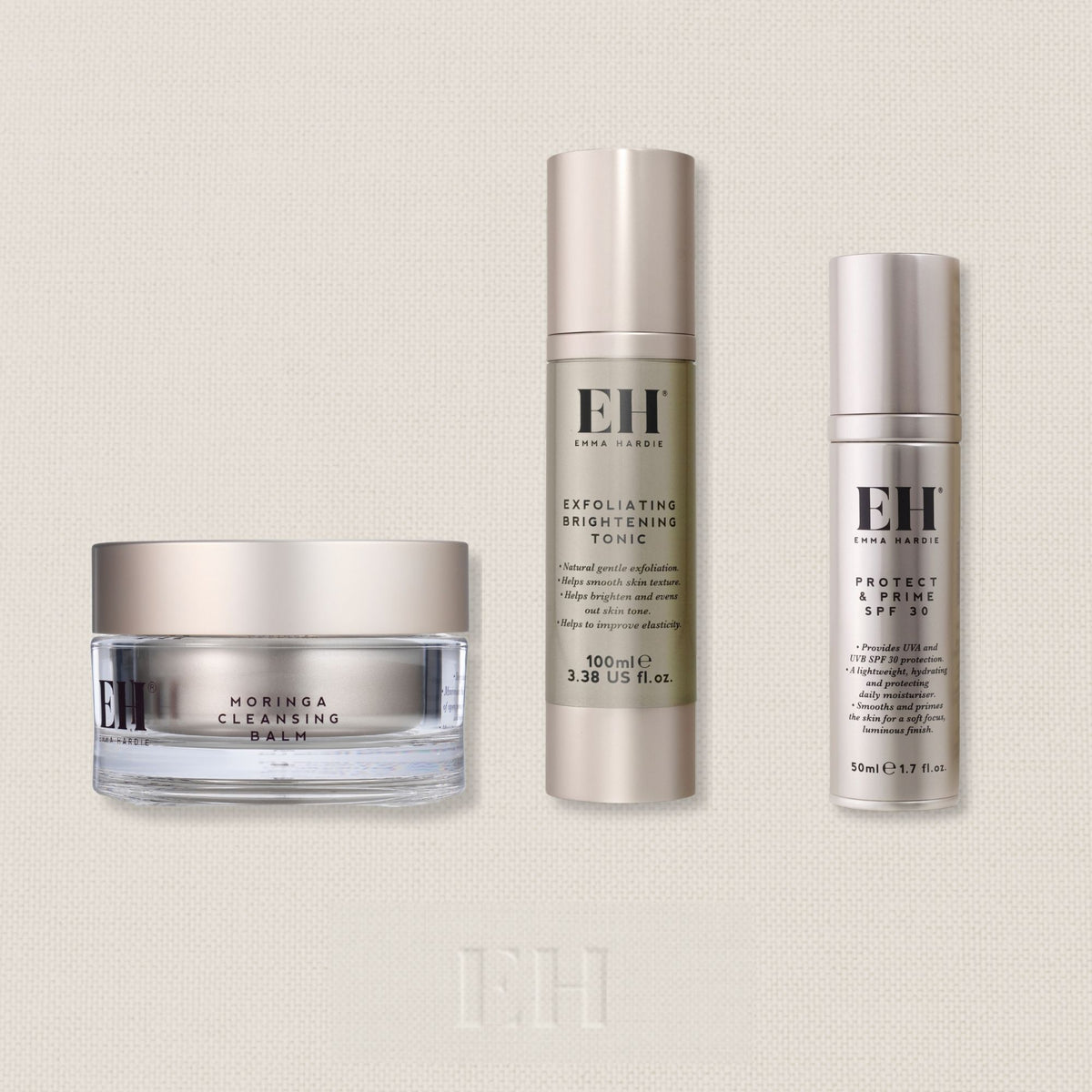 Emma Hardie Everyday Essentials ritual including Moringa Cleansing Balm, Exfoliating Brightening Tonic, Protect & Prime SPF 30 on neutral background