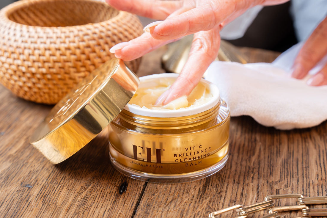 A woman using a skincare product
