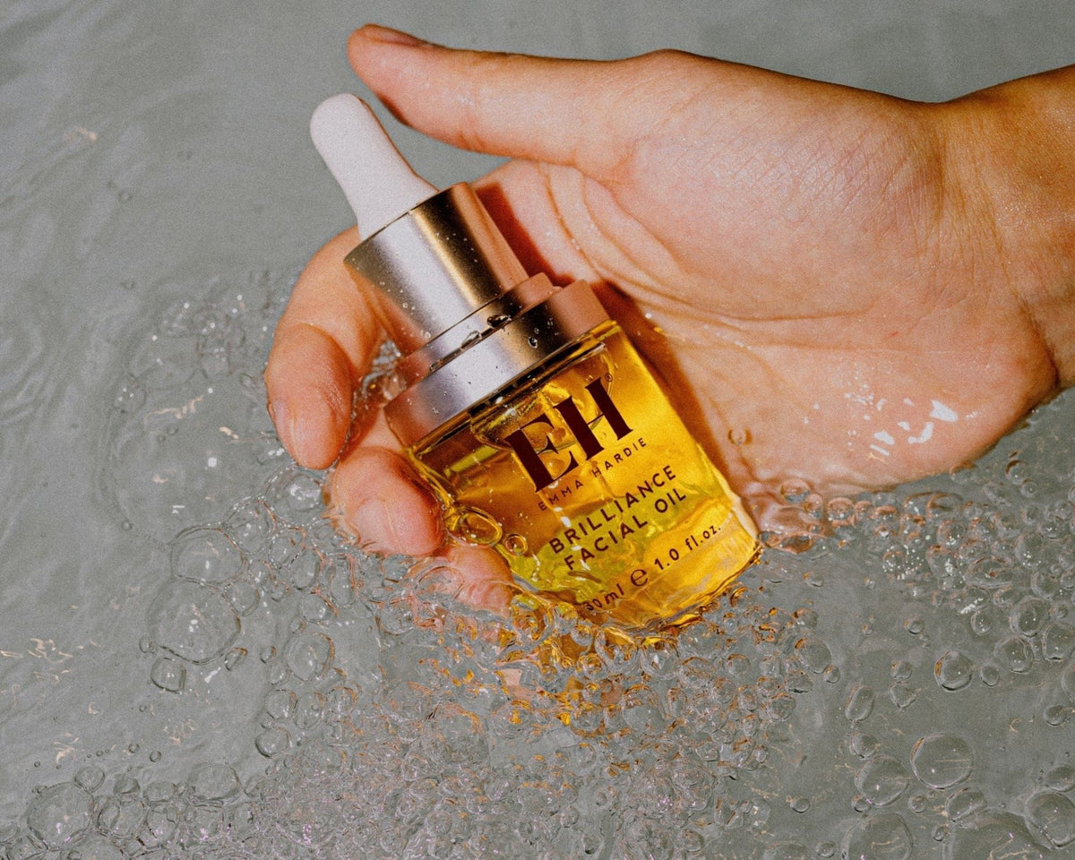 Facial oil bottle in water