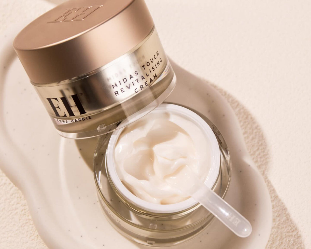 Emma Hardie Midas Touch Revitalising Cream with an open jar showing the cream texture and application spatula.