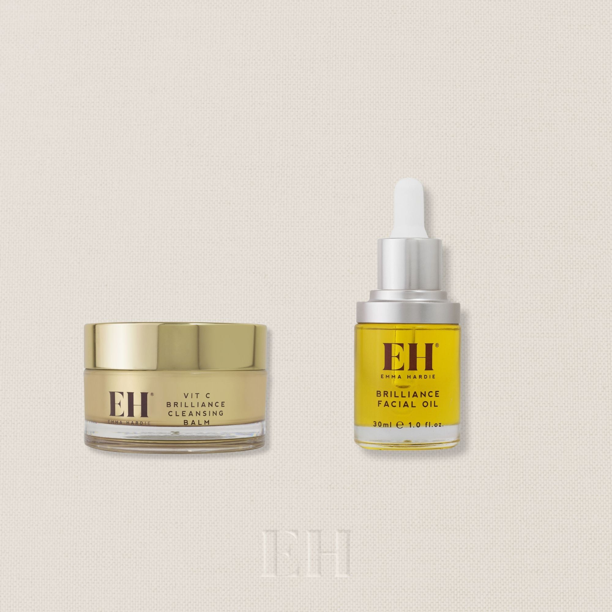 A ritual set with a gold jar of Emma HardieVit C Brilliance Cleansing Balm next to a yellow dropper bottle of Emma Hardie Brilliance Facial Oil, with a circular price badge reading 'Worth £95' in the top right corner.