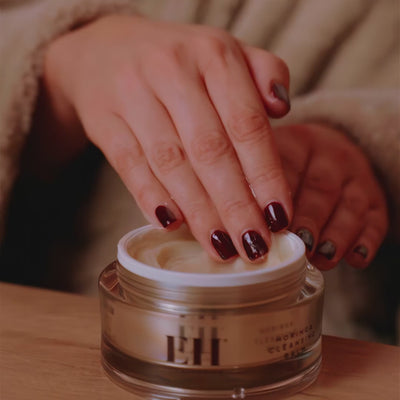 Woman using Emma Hardie cleansing balm to remove full face of make up.