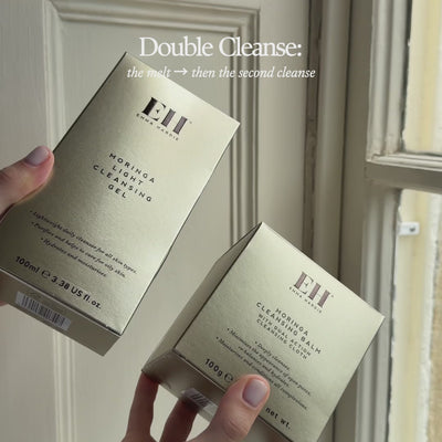 Emma Hardie double cleanse ritual with Moringa Cleansing Balm and Moringa Light Cleansing Gel at a bathroom sink.